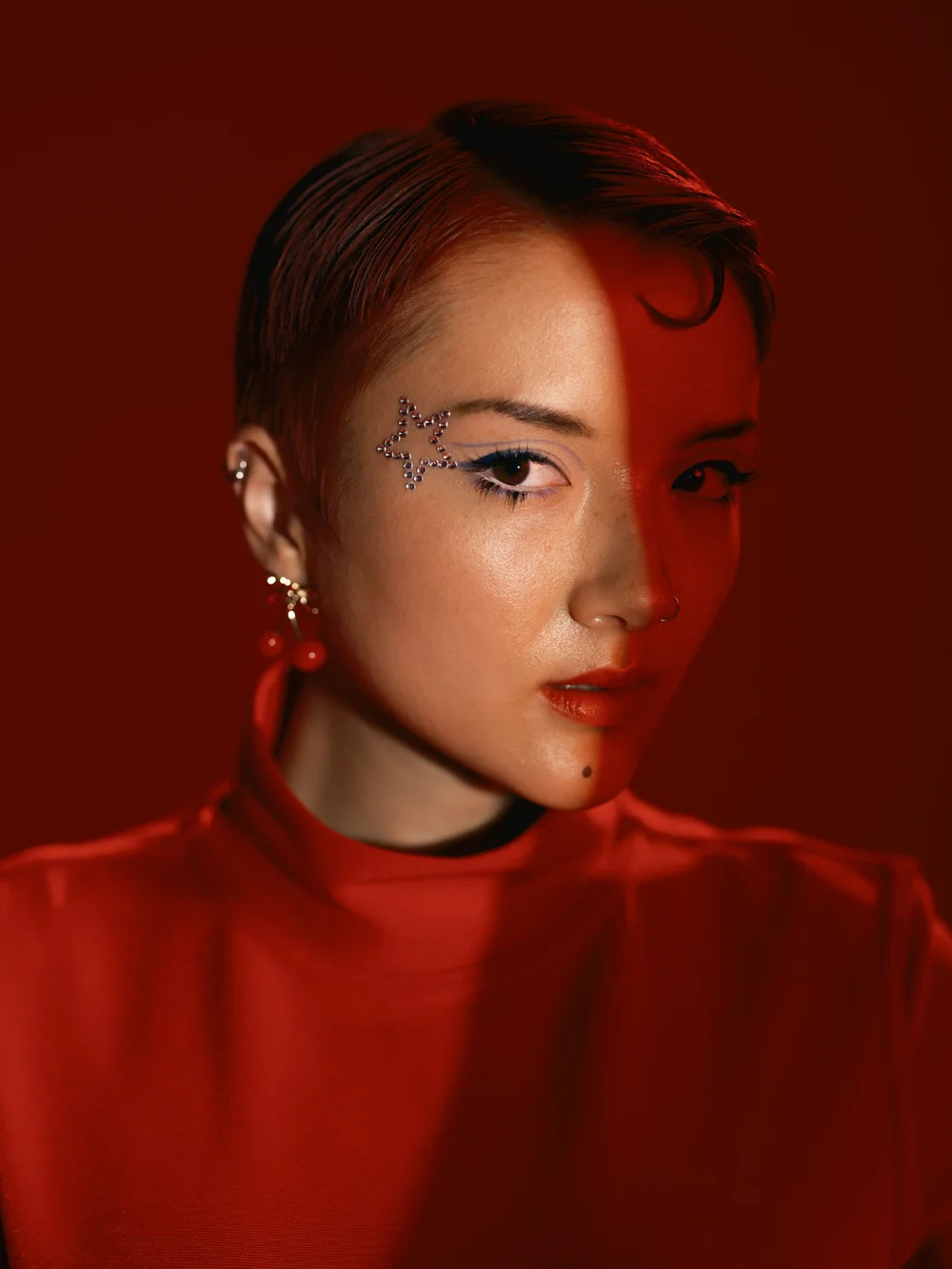 Young woman in a red-lit portrait