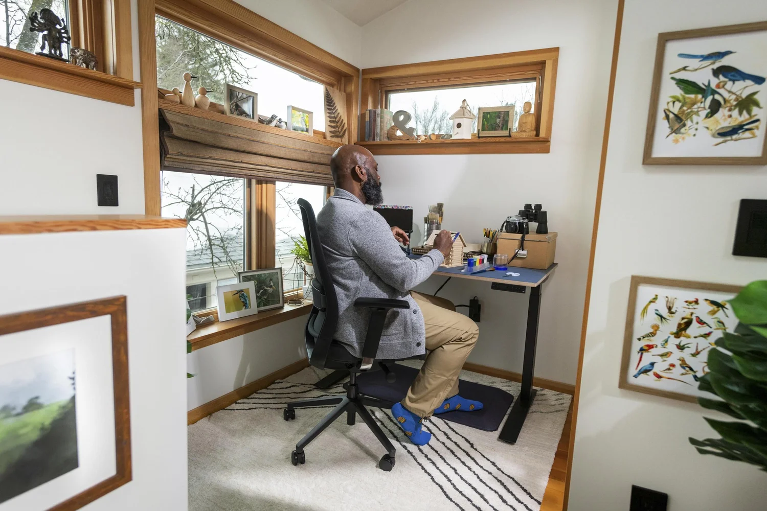 Environmental portrait at a bright home workspace