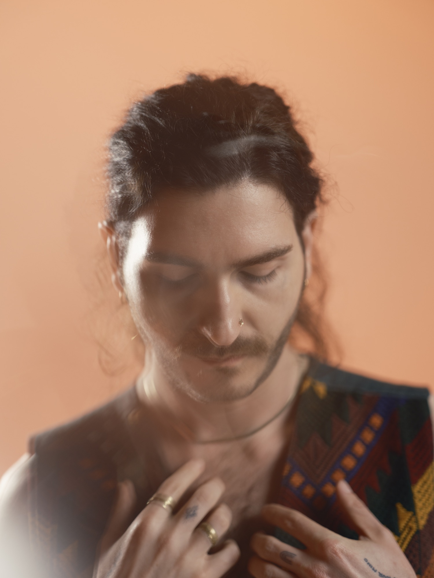 Actor portrait shaped by warm reflections