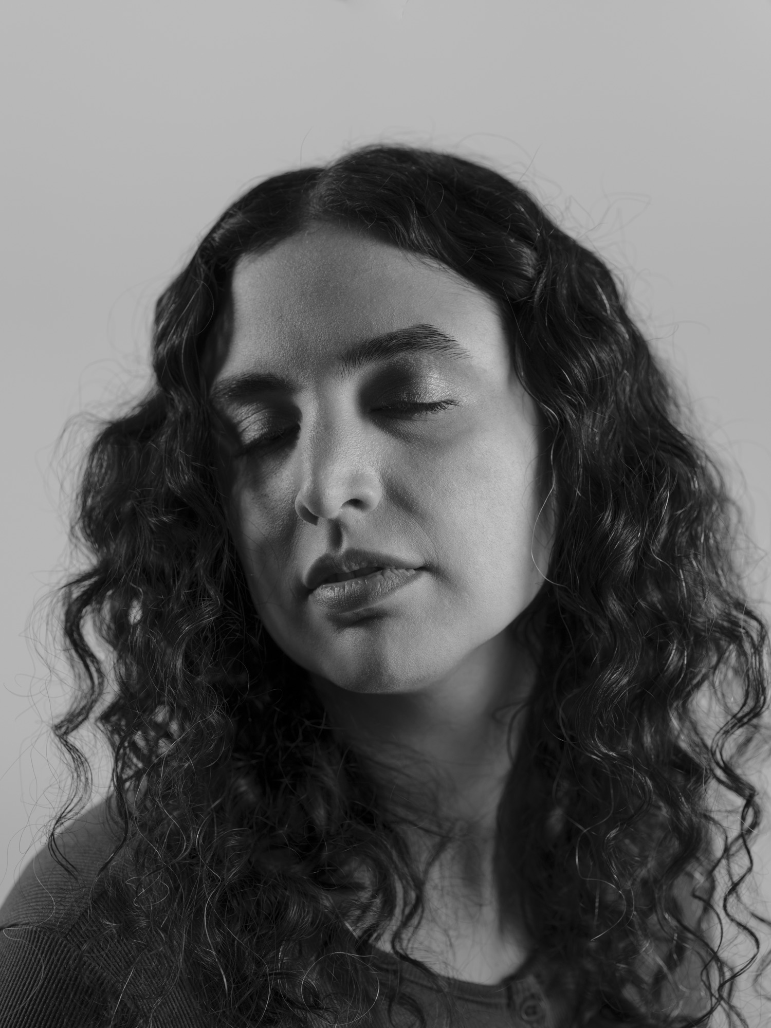 Black-and-white portrait of Taraneh Zohadi